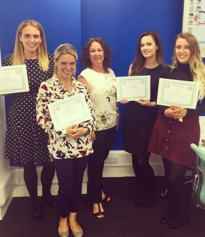 Smile Education Safer Recruitment Training participants with their certificates 