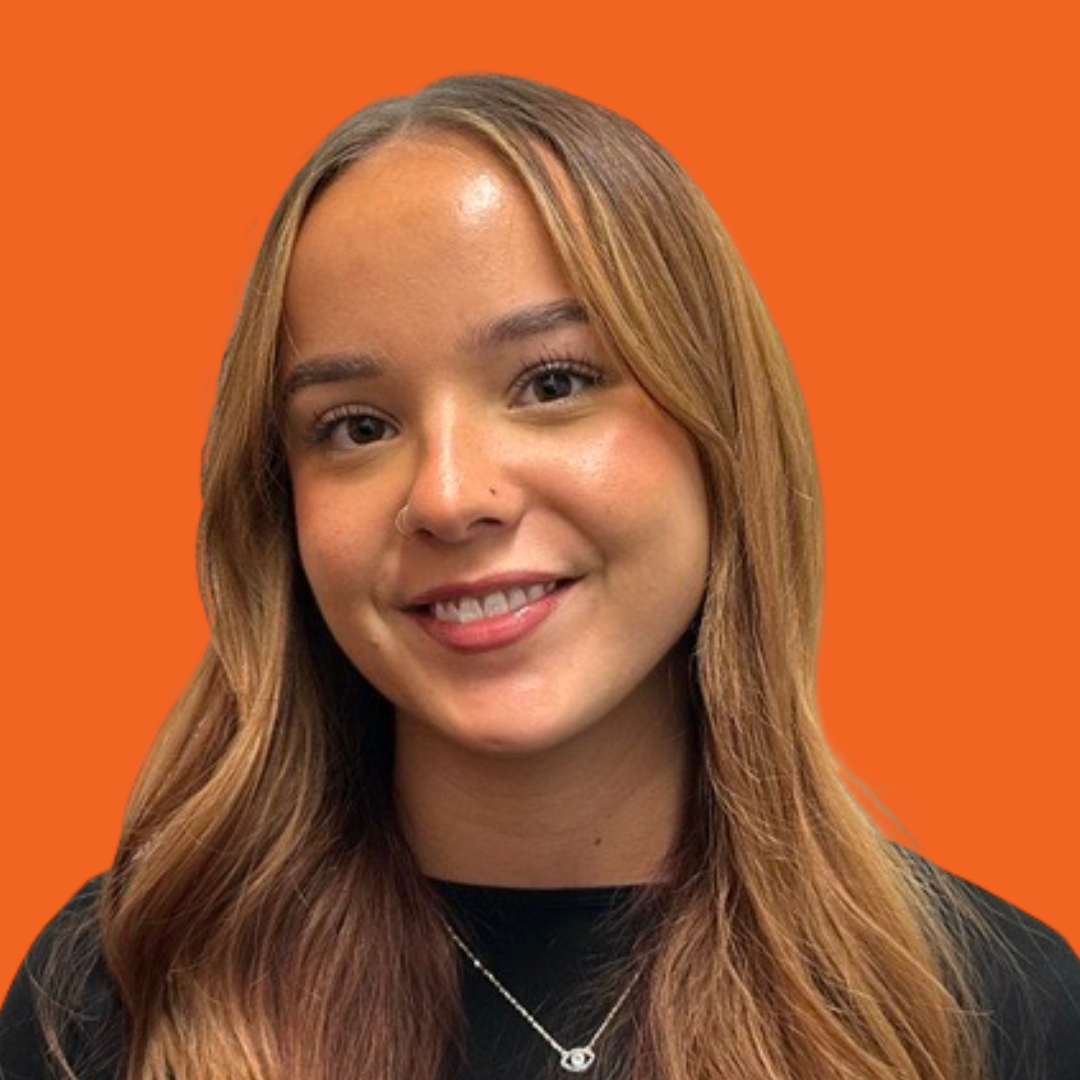 Holly, East Midlands Recruitment Consultant, on an orange background